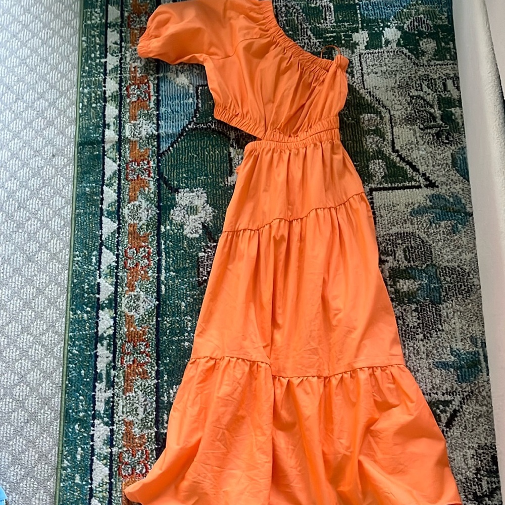 A Steve madden long dress. Off the shoulder and cut outs.